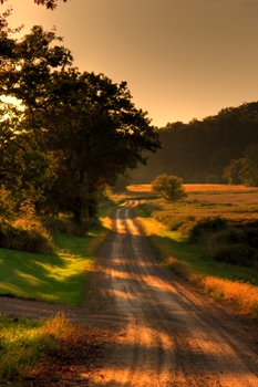 This photo of a Wisconsin country road at sundown really brings home the feel and meaning of "country".  The photo was taken by Madison, Wisconsin photographer Brian Lary. 